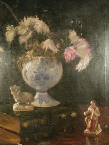 20thC School. Still life of flowers in a Delft vase with book and figures