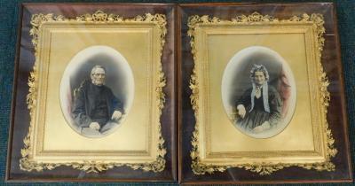 A pair of Victorian hand painted photographs