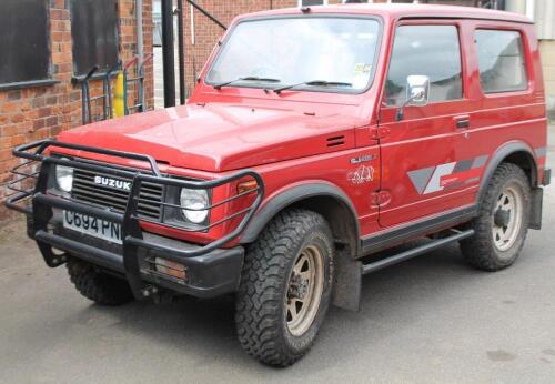 A Suzuki five speed SJ413 JX Jimny four wheel drive off road car