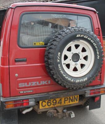 A Suzuki five speed SJ413 JX Jimny four wheel drive off road car - 2