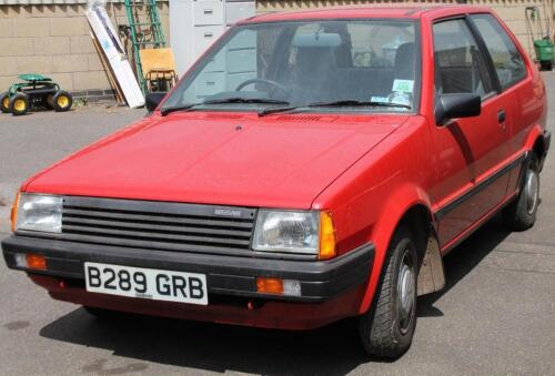 A Nissan Micra GL two door car