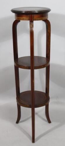 An Edwardian mahogany circular cake stand or whatnot