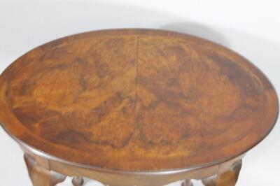 A 20thC walnut occasional table - 2