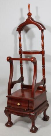 A 20thC mahogany finish clothes vanity stand