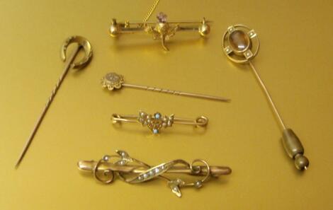 Three Edwardian and later 9ct gold bar brooches and three stick pins