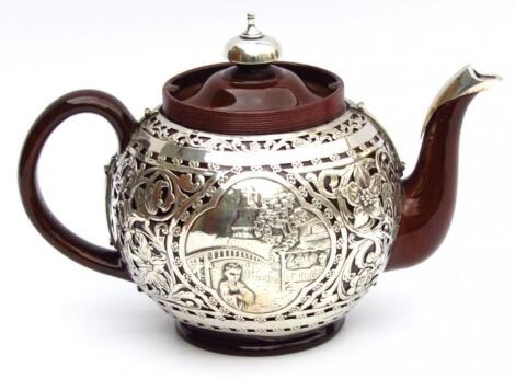 An Edwardian Royal Doulton brown pottery teapot