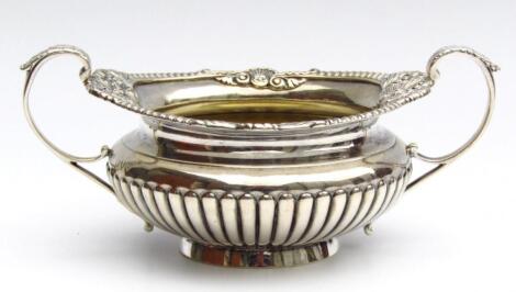 A Victorian silver and silver gilt two handled sugar bowl