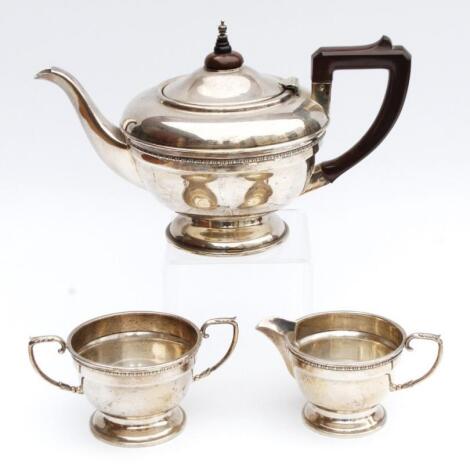 A George V silver three piece tea service