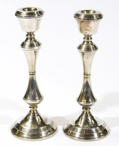 A pair of Elizabeth II silver candlesticks