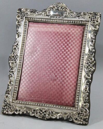 An Edwardian silver photograph frame