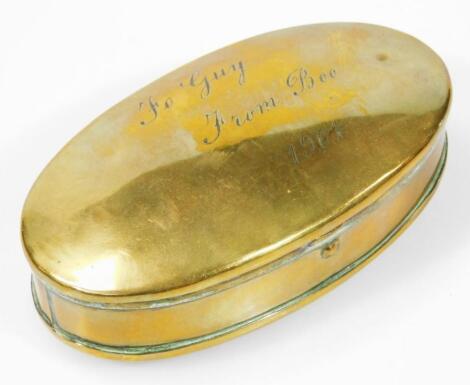 An Edwardian brass snuff box