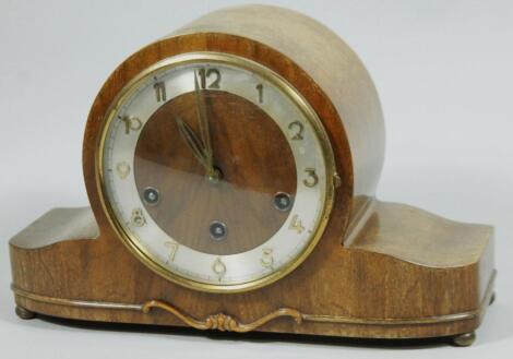 A mid 20thC Art Deco design walnut cased Napoleon hat mantel clock