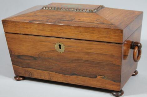 A Regency rosewood sarcophagus shaped tea caddy