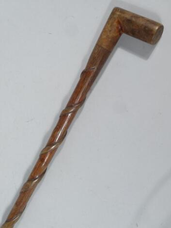 An early 20thC Folk Art oak walking stick