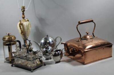 A 20thC silver plated six bottle cruet set