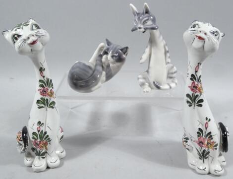 A 20thC Royal Copenhagen porcelain figure of a recumbent kitten