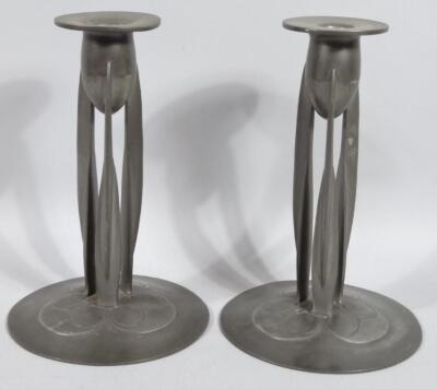 A pair of Archibald Knox design Tudric pewter Arts & Crafts metal candlesticks