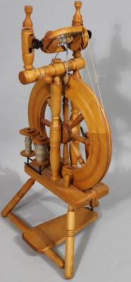 A modern light wood spinning wheel - 2