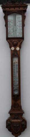 A Victorian oak stick barometer