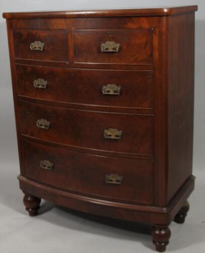 A Victorian figured mahogany bow front chest of drawers