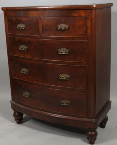 A Victorian figured mahogany bow front chest of drawers