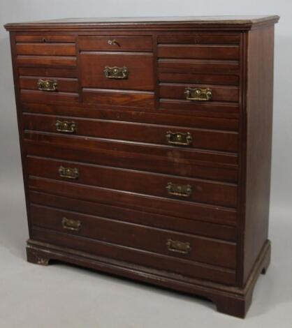 A late Victorian walnut chest of drawers