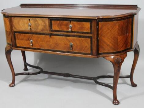 An early 20thC mahogany and chequer banded sideboard