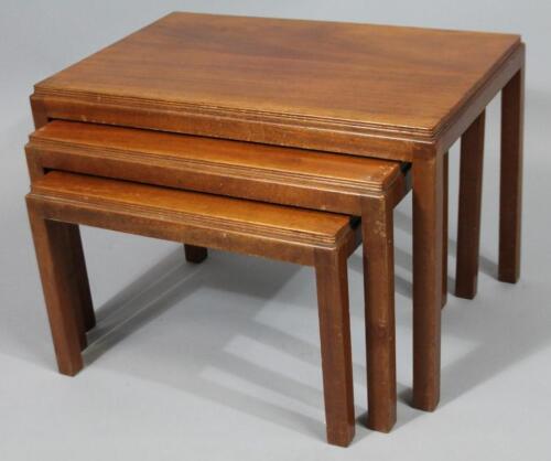 A nest of three Gordon Russell mahogany tables