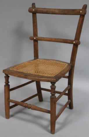 An early 20thC rush seated child's chair