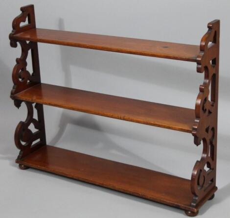 A late 19thC mahogany open wall shelf