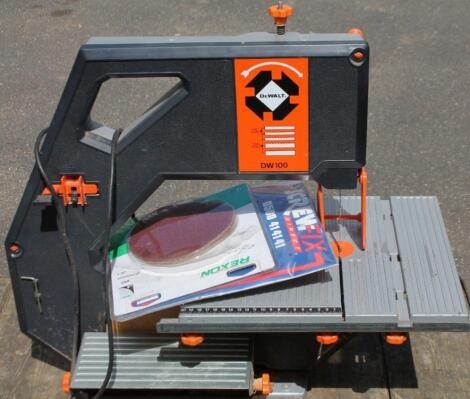 A Dewalt 100 table fret saw