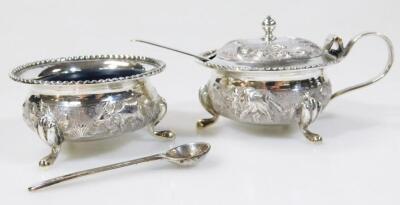 An Indian white metal three piece cruet set - 4