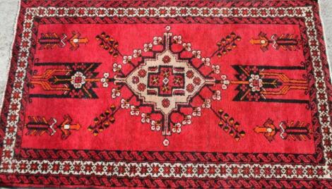 A Persian floral pattern rug