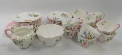 A Shelley porcelain tea service decorated in the Wild Flowers pattern