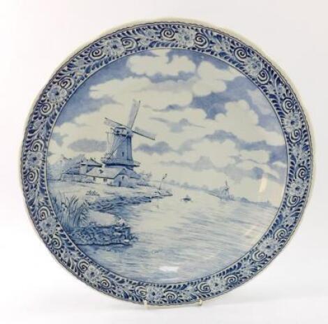 A Boch Delfts blue and white pottery charger