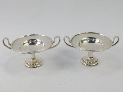 A pair of Edward VII silver sweetmeat dishes or pedestal salts