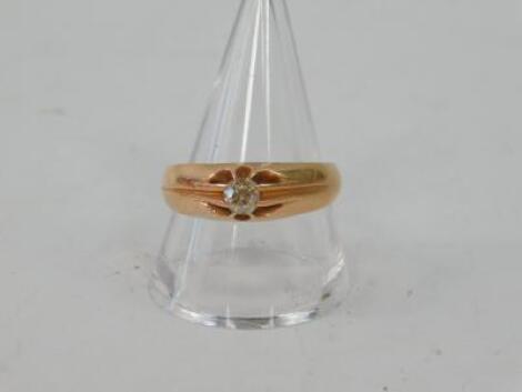 A gentleman's diamond solitaire ring