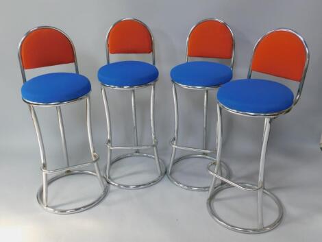 A set of four retro aluminium bar stools