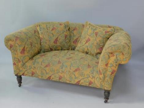 A Victorian drop arm sofa