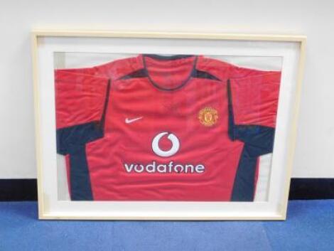 A Manchester United Football Shirt attributed as signed by Ryan Giggs