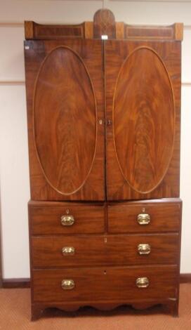 A George III mahogany press cupboard