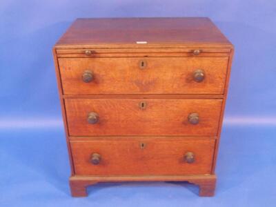 A Georgian oak bachelors chest