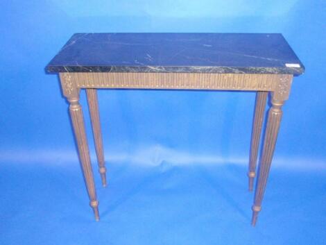 A 20thC gilt finished console table with reeded legs and marble top