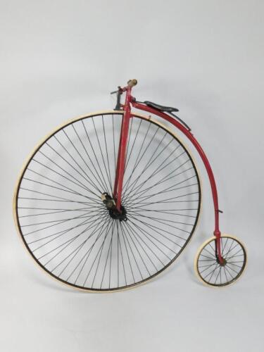 A red framed penny-farthing