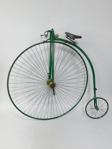 A green framed penny-farthing