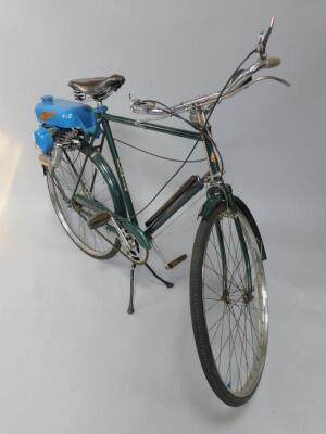 An Elswick green framed gentleman's bicycle with a blue Mini Motor