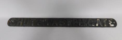 A cast iron railway sign