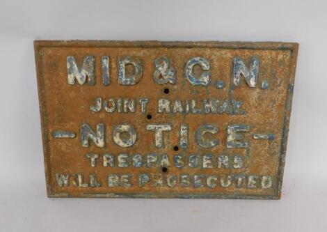 A Midland and Great Northern cast iron railway sign