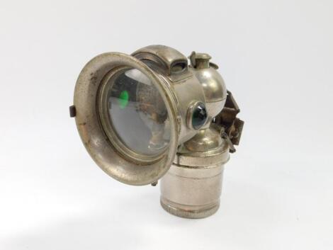 A Miller Carbide bicycle lamp.