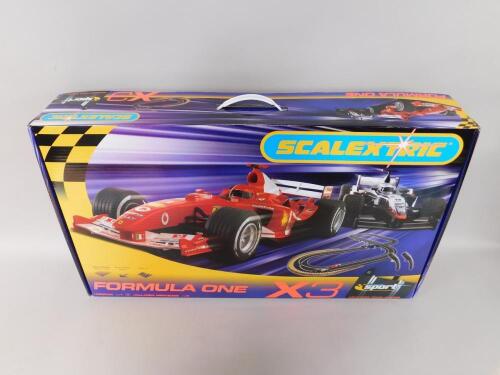 A Scalextric Formula 1 X3 boxed set